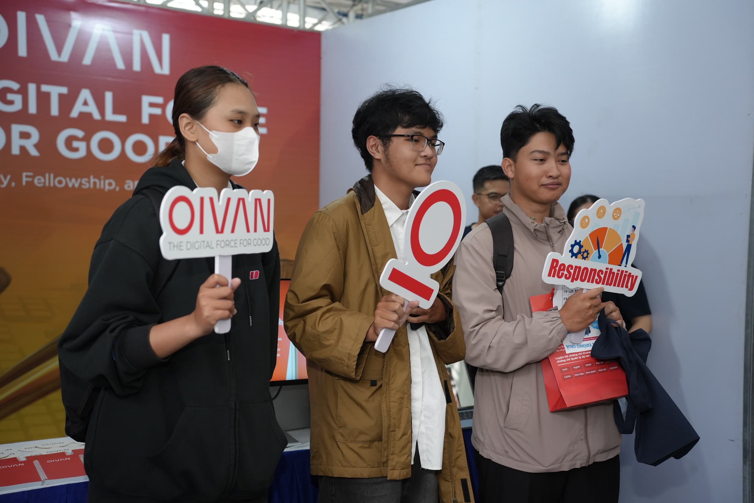 Guests at a partner booth, DevDay 2026